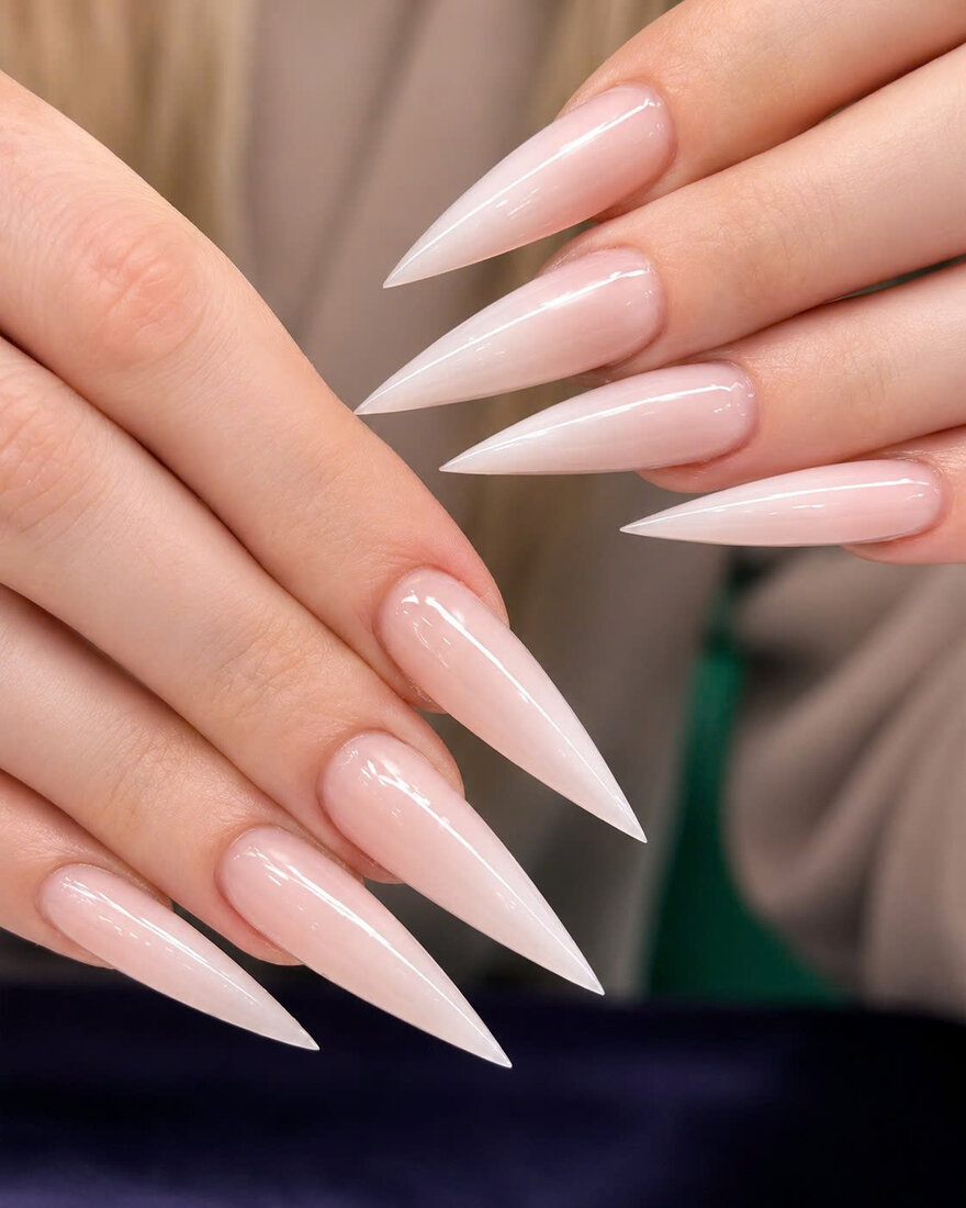 Glossy nude gel color manicure with almond-shaped nails