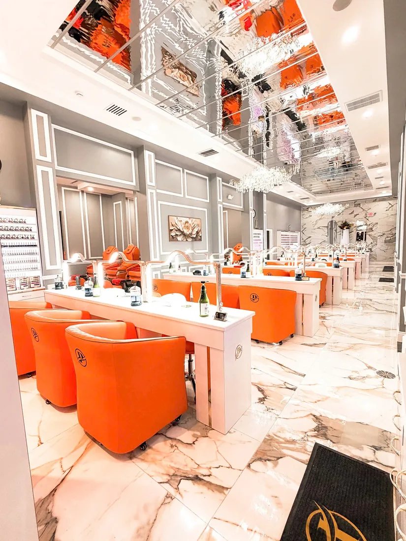 Wide manicure floor with mirrored ceiling at Perfection Nail Spa VI Hamburg NY